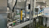 キユーピー、惣菜用ふた閉めロボットを安川電機と共同開発し惣菜工場にて実運用を開始