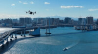 首都高・JDRONE・NTT Com・KDDI、長大橋の自動点検にドローンを活用した実証実験を実施